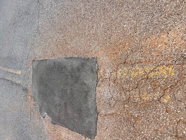 Expert Pothole Repair at AMC Theater on Bayou Blvd in Pensacola, FL by Parking Lot Maintenance of the Panhandle